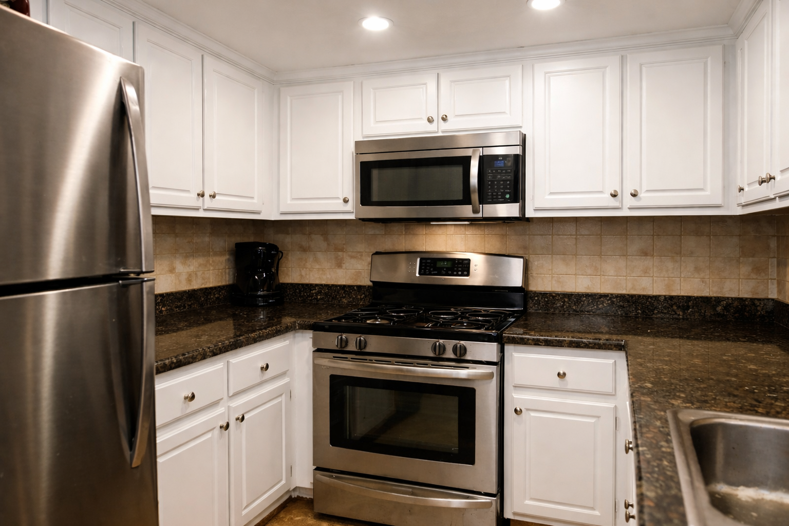 Kitchen cabinets after professional painting — crisp white finish, Los Angeles